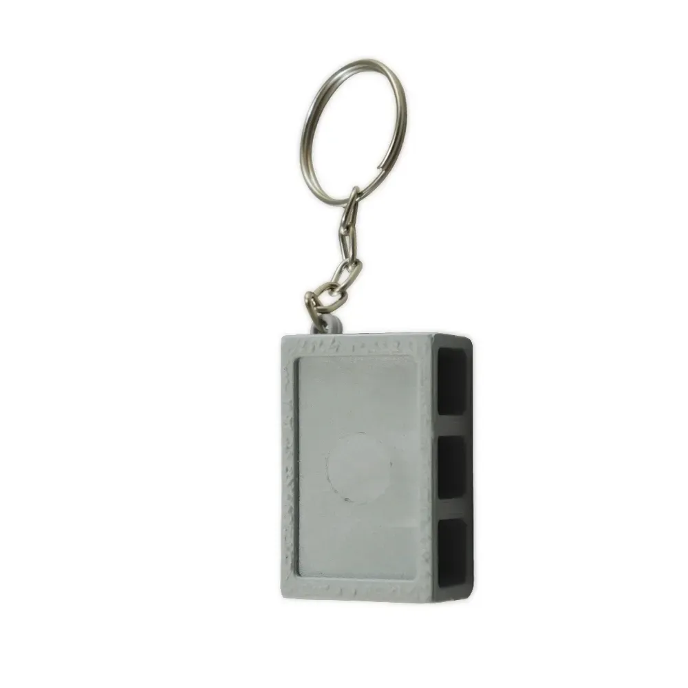 Chaveiro personalizado de plástico em formato de bloco de concreto, cor cinza